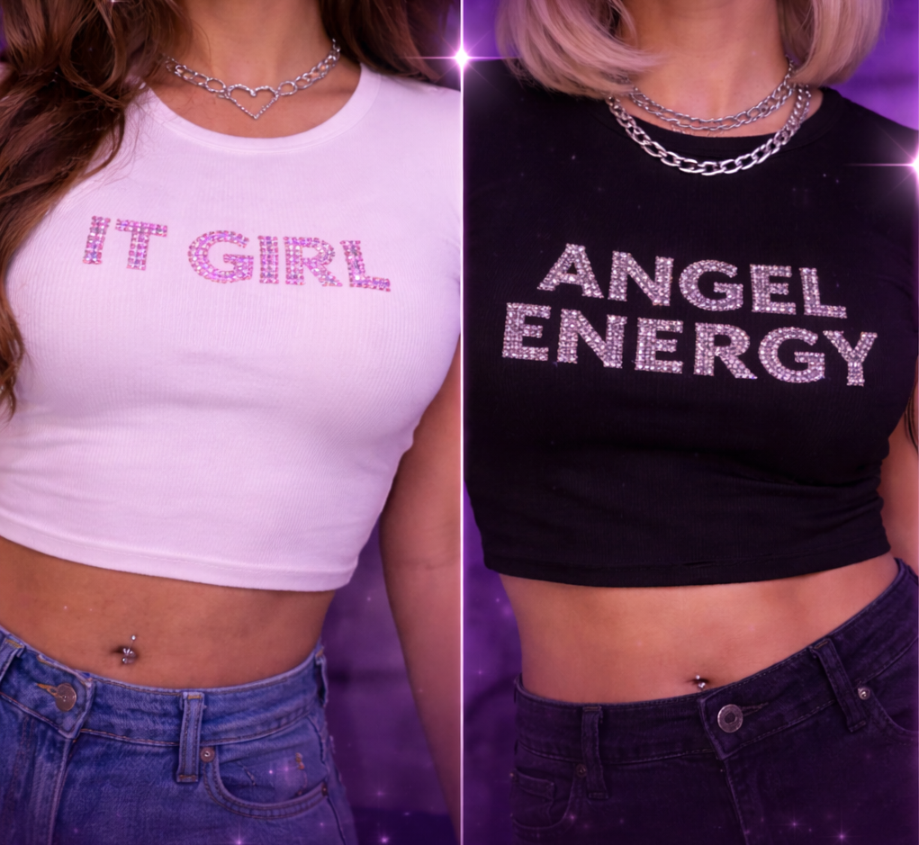 Three women wearing crop tops with bling rhinestone phrases 